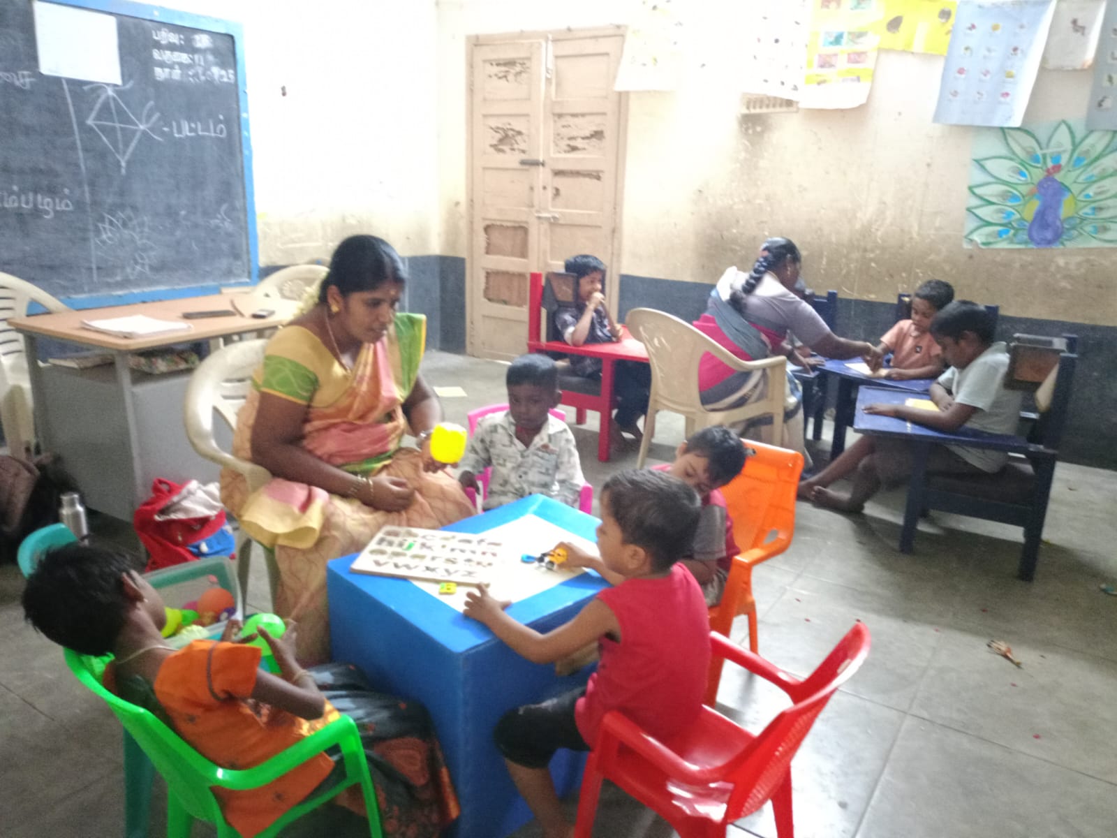 Children and staff in a learning activity